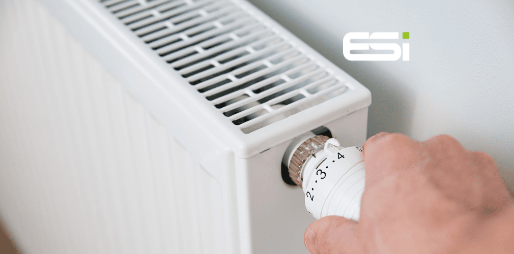 Hand adjusting temperature of a radiator